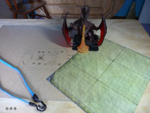 Some useful accessories: elastic tie downs, acrylic sheet or gaming mat.